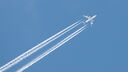 Aeroplane in clear blue sky