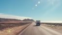 A sunny scene of campervan on American highway