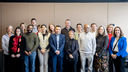 A large group photo of the attendees of the event co-hosted by the Institute for Sustainable Food and United Against Malnutrition and Hunger.