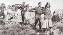 Communist fighters walking through Greek hills in the late 1940s