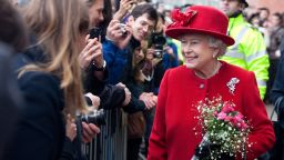 The Queen greeting people while on a visit to the University - image 