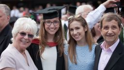 A family celebrating at graduation