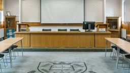 Moot Court with tables and chairs in a scare design