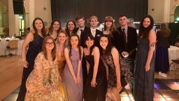 Mixed group of students dressed up during a studnet ball