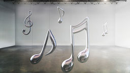 Musical notes hanging from a ceiling