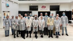 A group of students pose at Nestle 