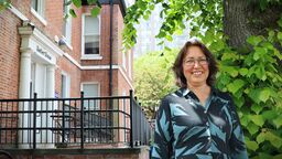 Cindy Cooper outside, smiling