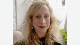 Headshot of Jess Bradley, stood outside 