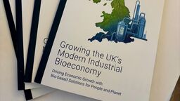 Physical copies of the white paper, featuring a leaf in the shape of the UK