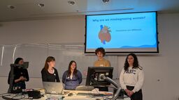 Photo of engineering students giving a group presentation